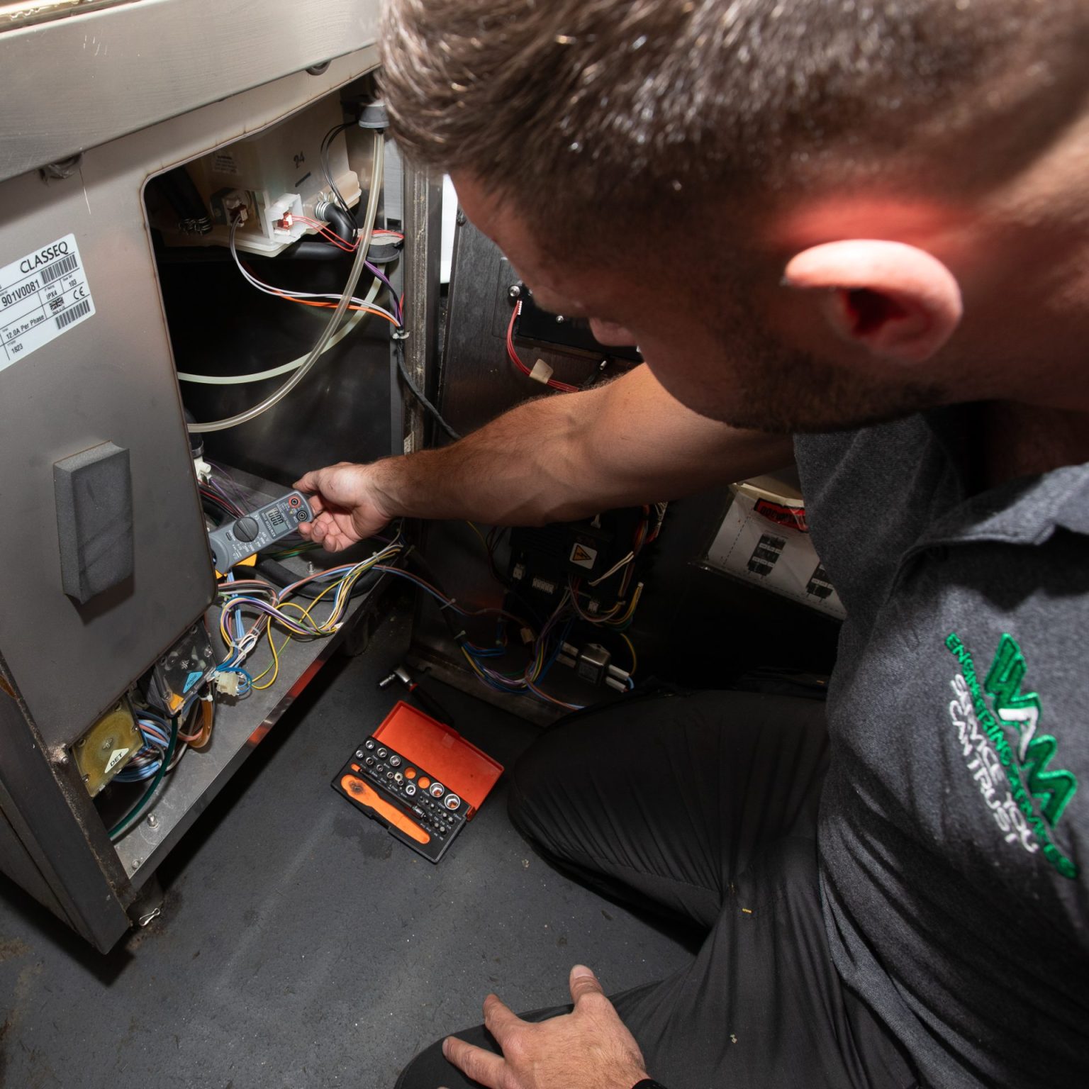 Ben checking the wiring on some of Pieminister in Cardiff's foodservice equipment