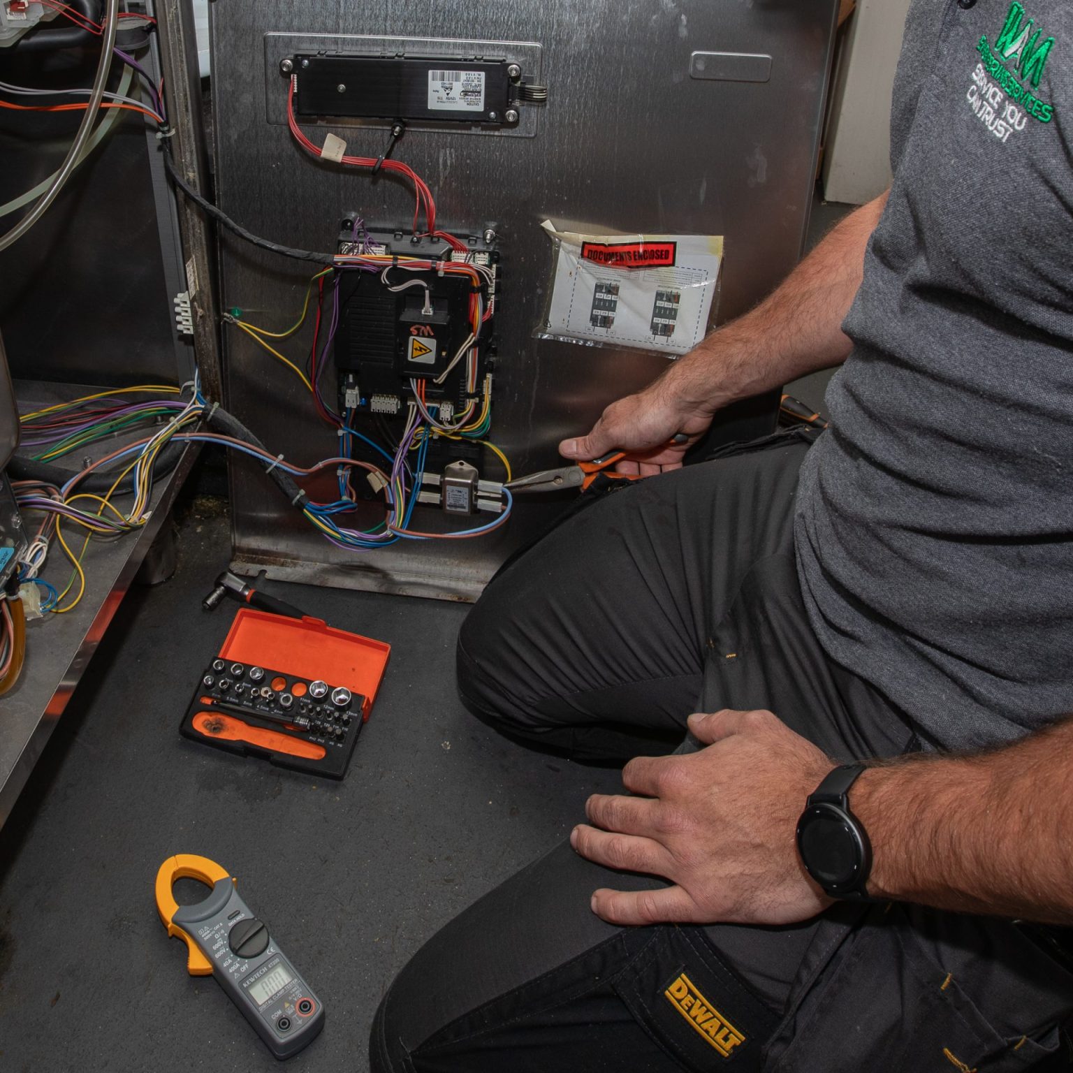 Our catering engineer inspecting a piece of commercial catering equipment
