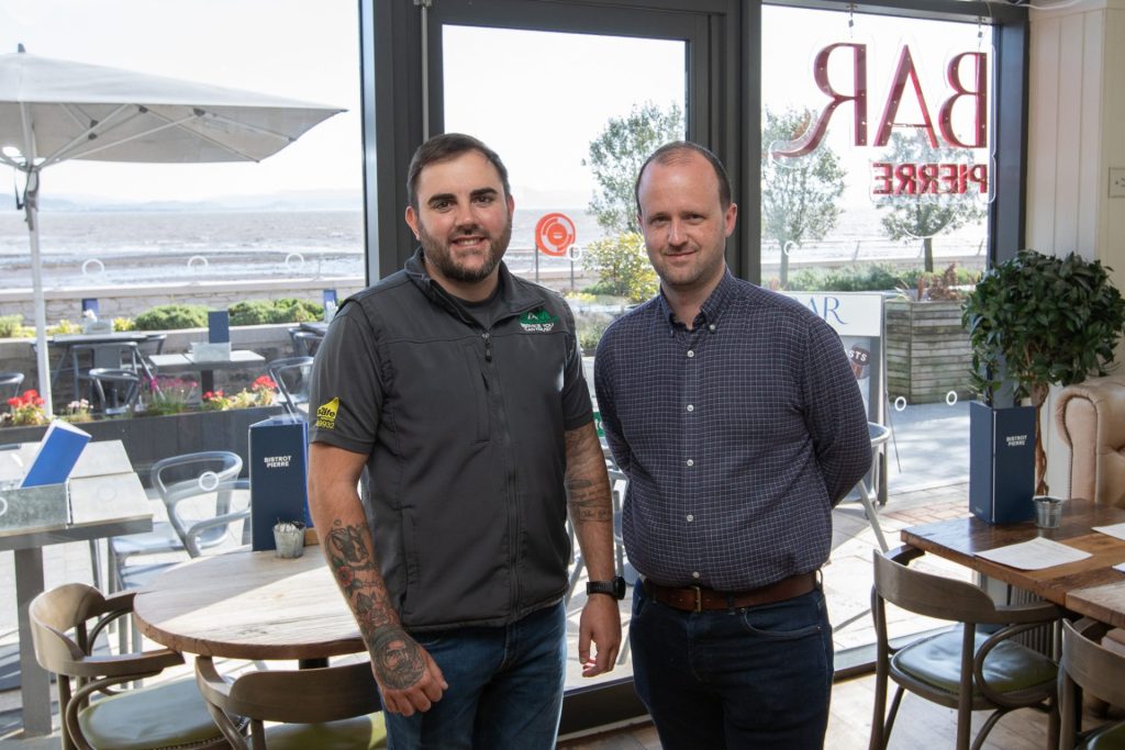 Alistair from WAM with the manager of Bistrot Pierre
